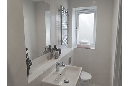 Micro cement (fino) in highly polished off white